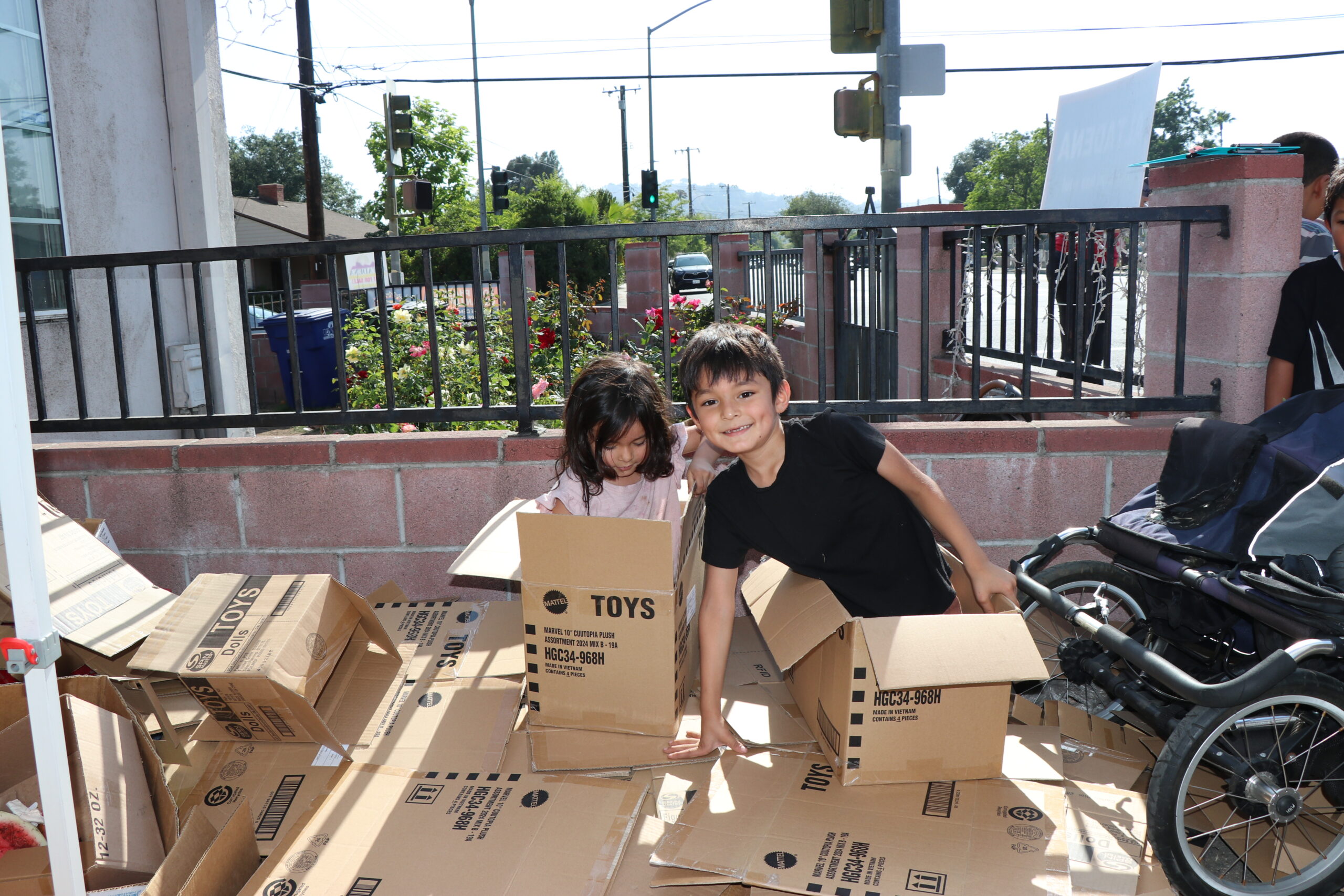 Children receiving donations at FRF distribution center